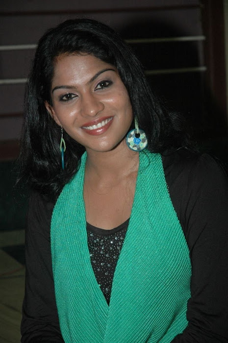 swasika in black dress at event